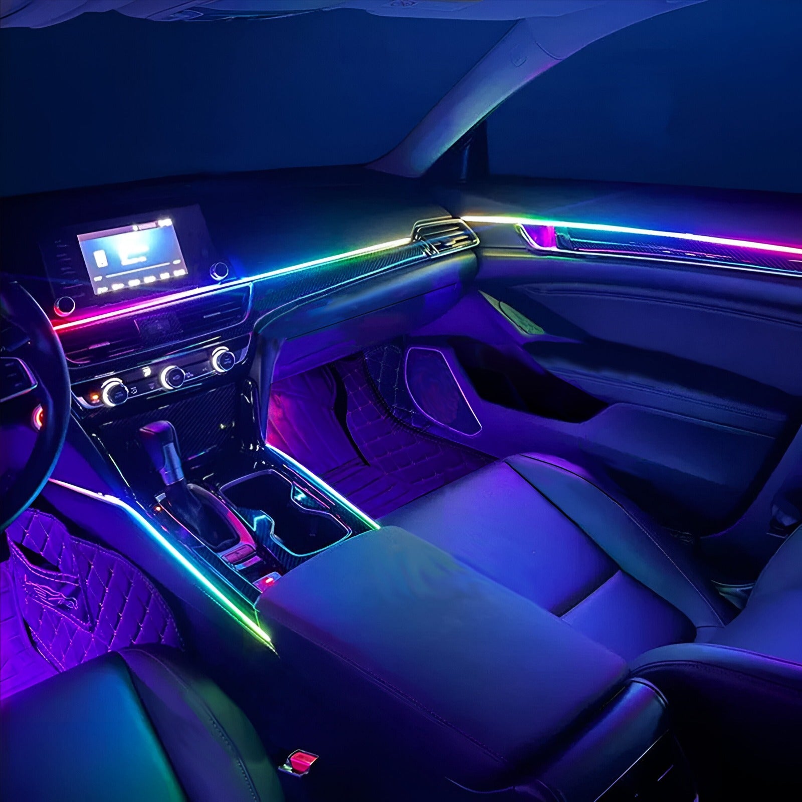 Car interior featuring the Nightglowe 14-in-1 ambient lighting kit with RGB LED dashboard strips, door panel lighting, center console illumination, and door pocket lights, showcasing a clean DIY ambient lighting upgrade