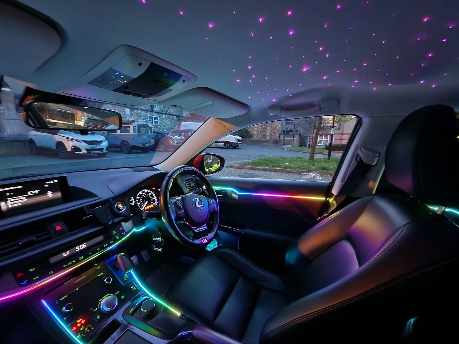 Lexus interior displaying RGB ambient lighting as well as startlight headliner on the roof, fibre optic lighting, mercedes benz lighting on lexus
