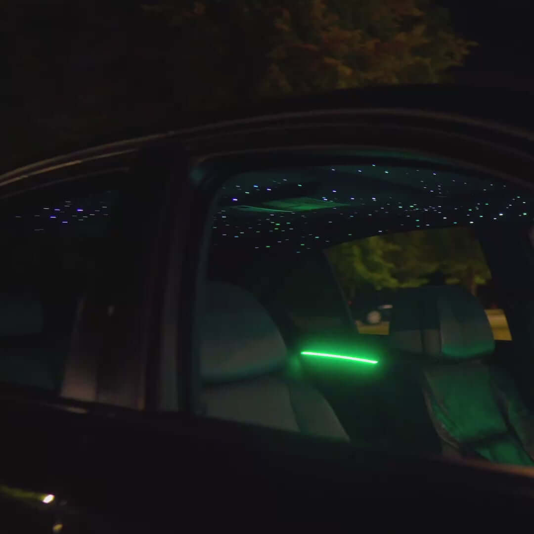 video showcasing Nightglowe's product after installation, starlight roofliner/headliner and ambient lighting kit on doors and dashboard of vehicle